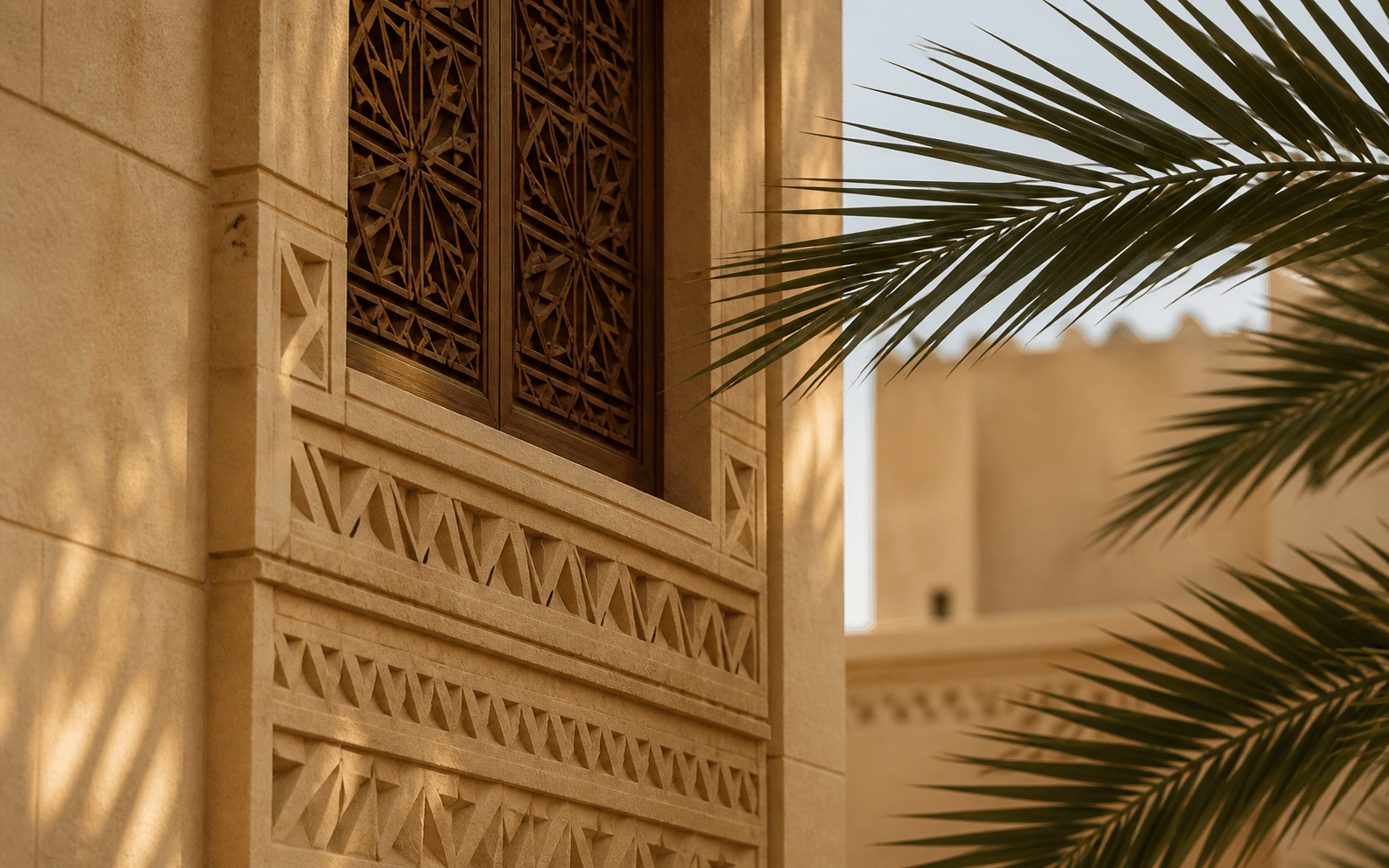 Traditional Saudi architectural detail and palm leaves